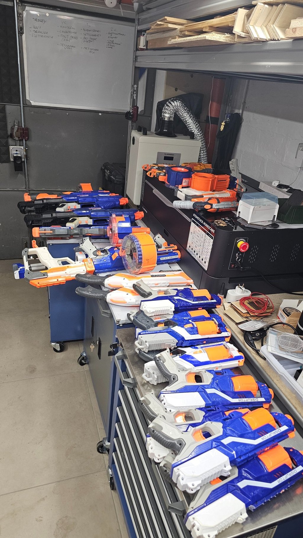 a bunch of nerfet guns are lined up on a table