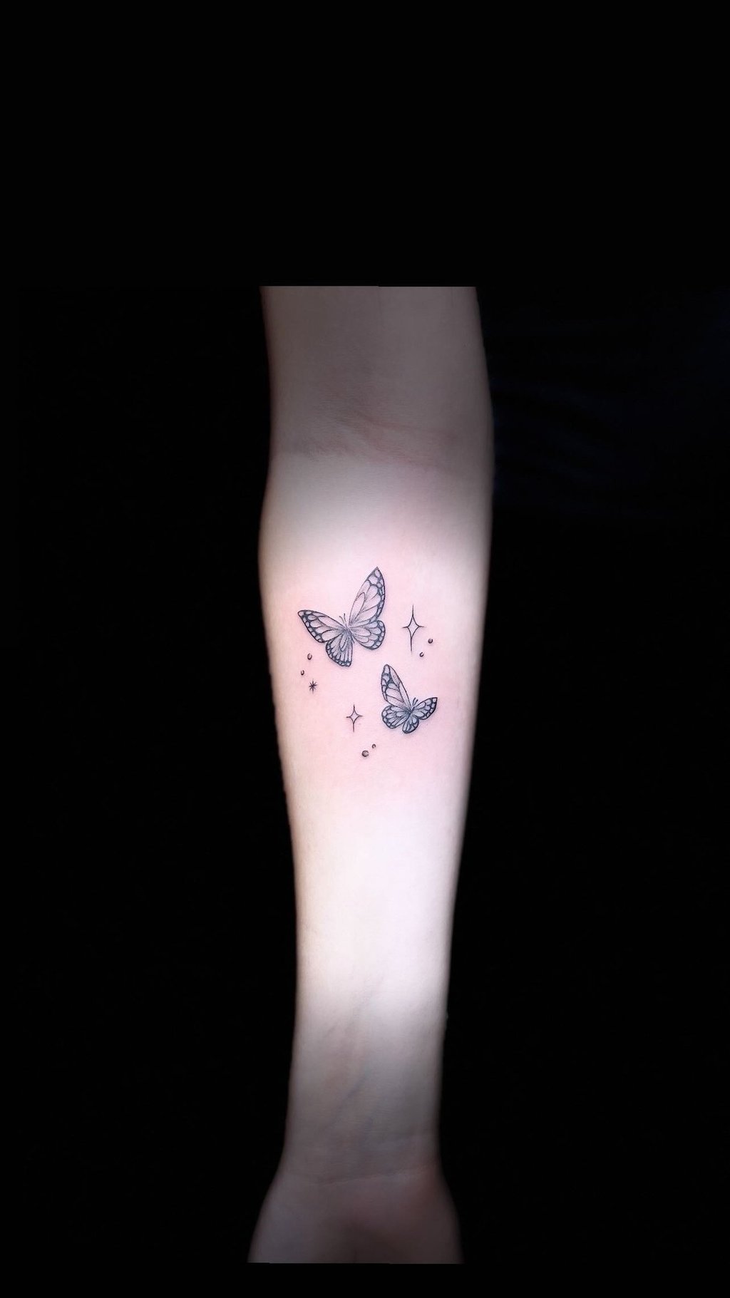 Fine line butterfly tattoo on wrist — Hurghada Tattoo Studio
