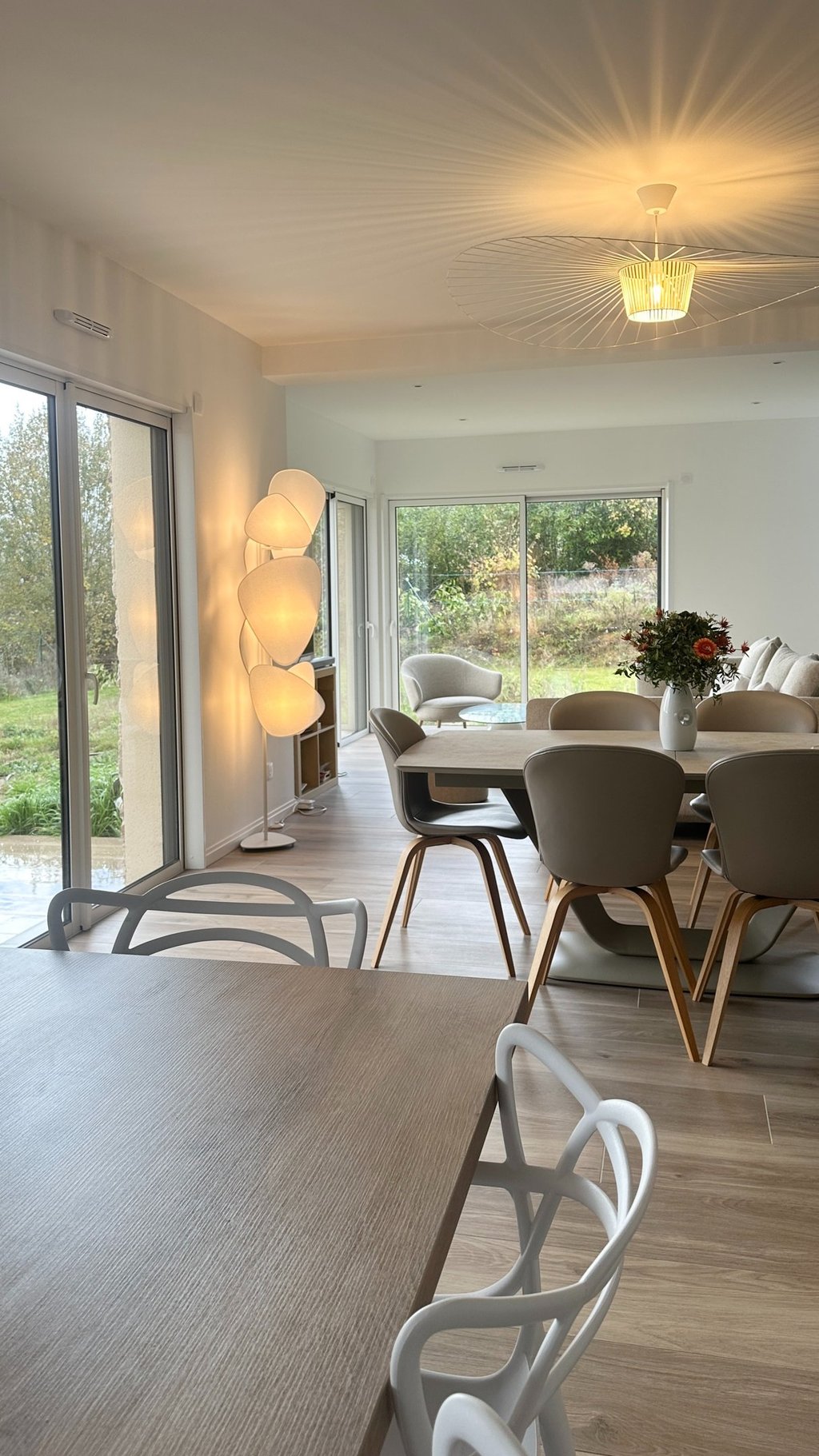 a dining room with a table and chairs