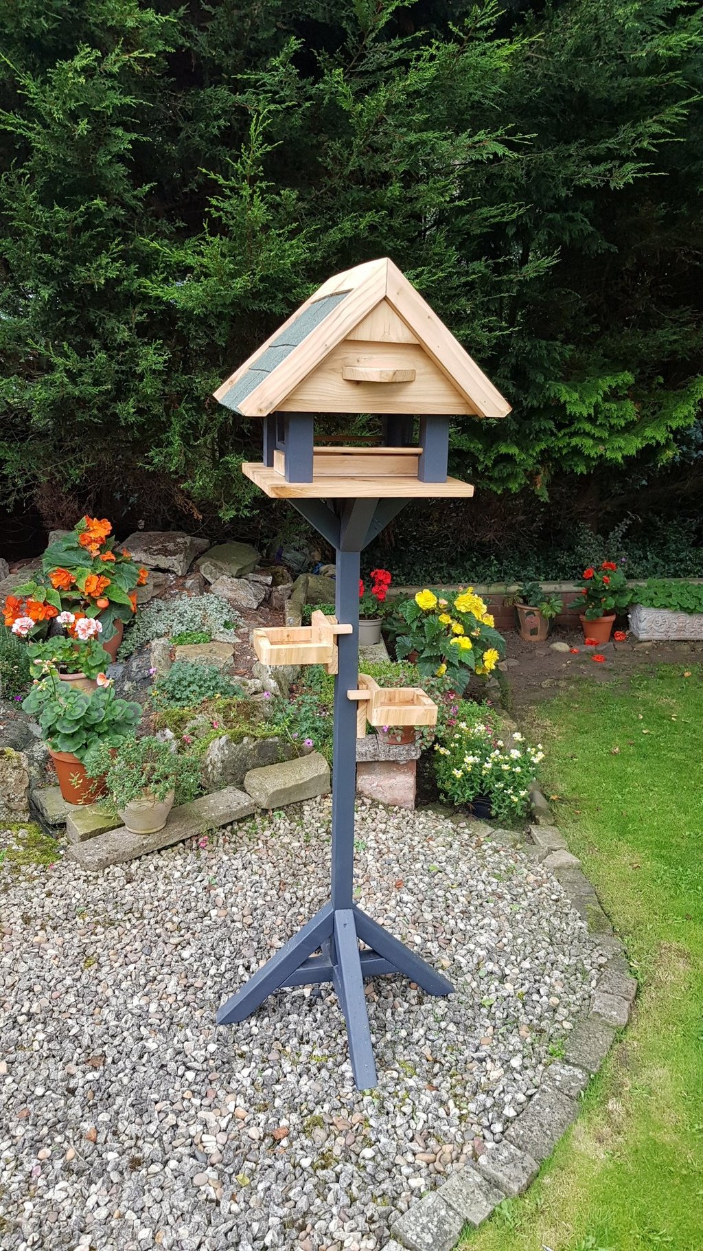 a bird table in a garden