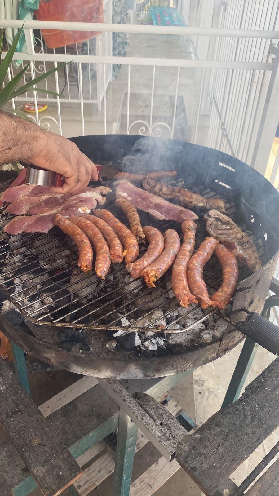 Grilling Sicillian food at hour digital nomad house in Sicily