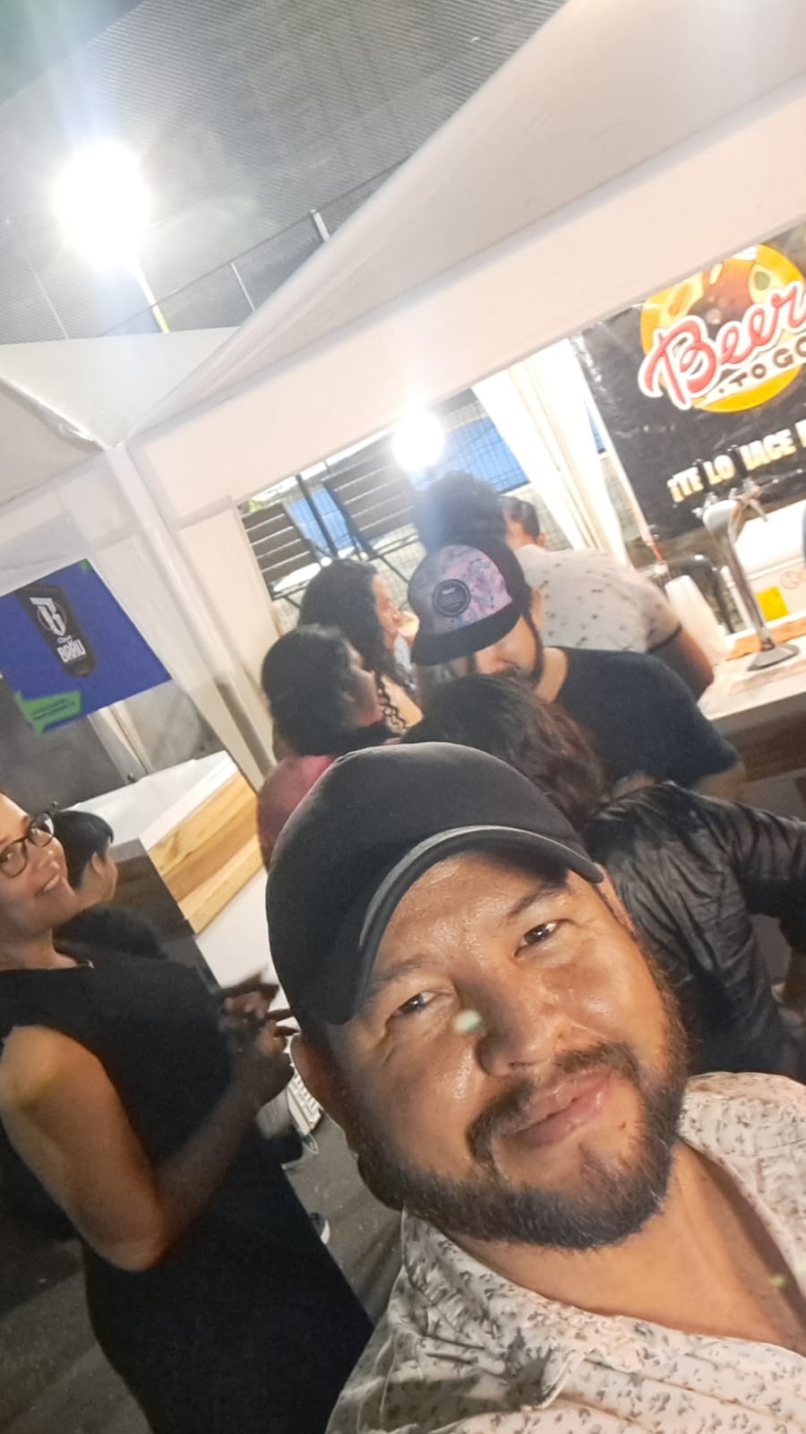 Jose Moreira having a beer with friends
