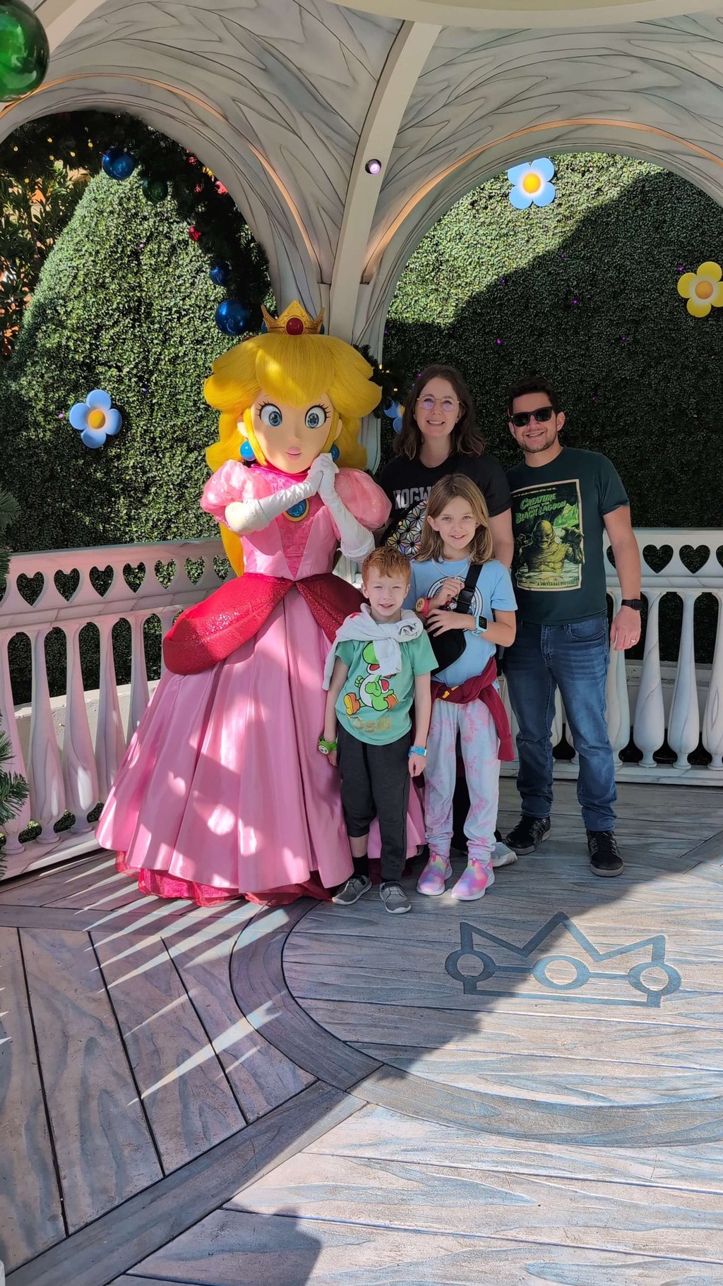 Katie Matzenbacher, Travel Agent, and her family with Princess Peach at Universal Studios Hollywood