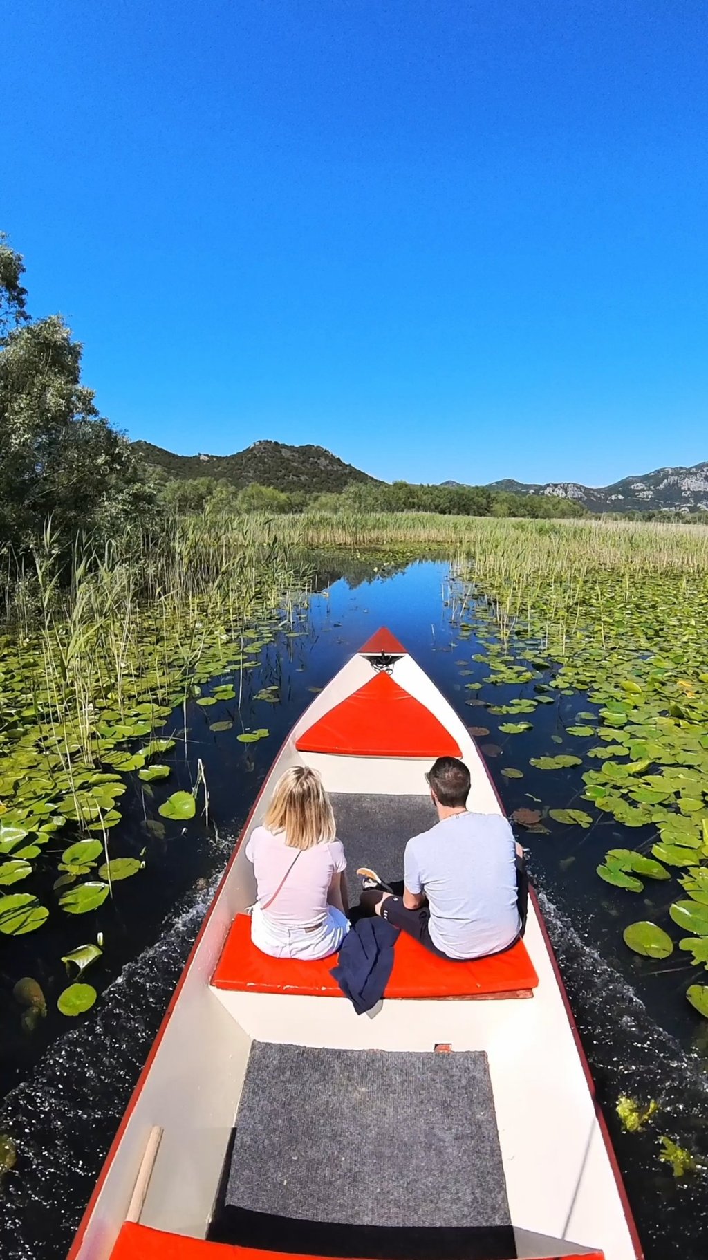small boat in narrow channel