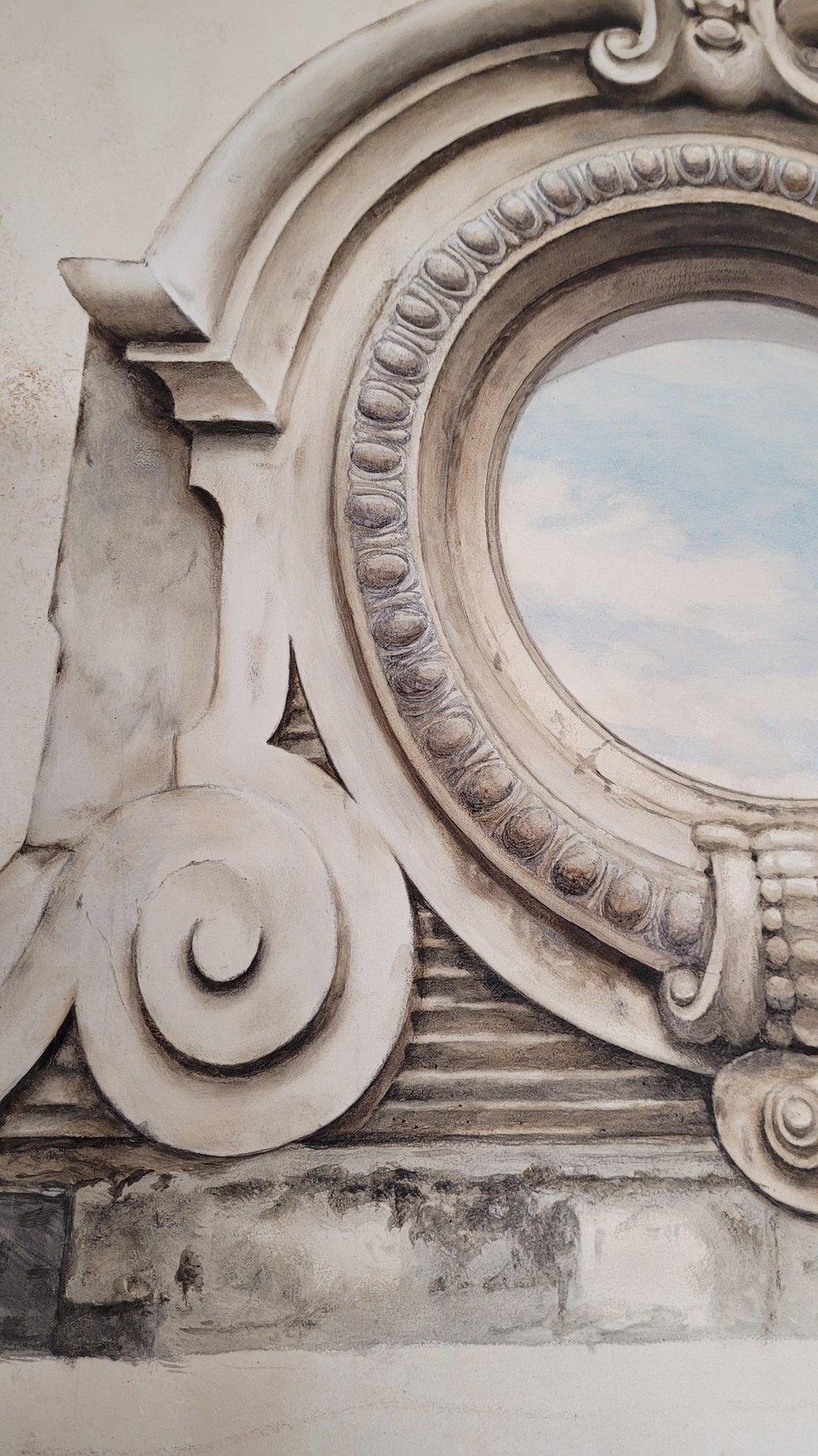 Détails d'une peinture décorative en trompe-l'oeil, un oeil de boeuf peint.