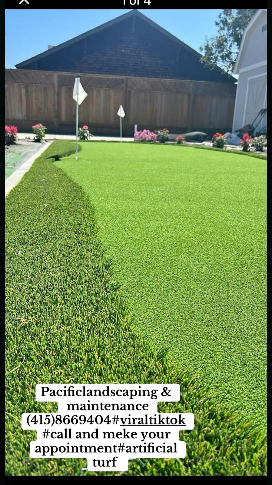 Artificial turf putting green installed in a residential backyard with golf flags, creating a relaxi