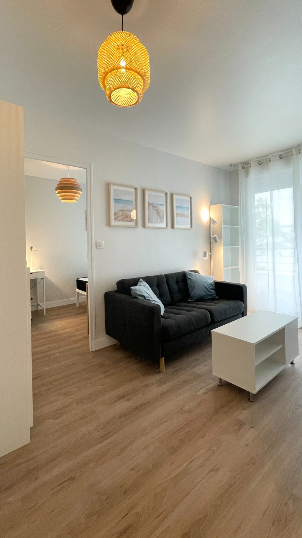 a living room with a couch and a table