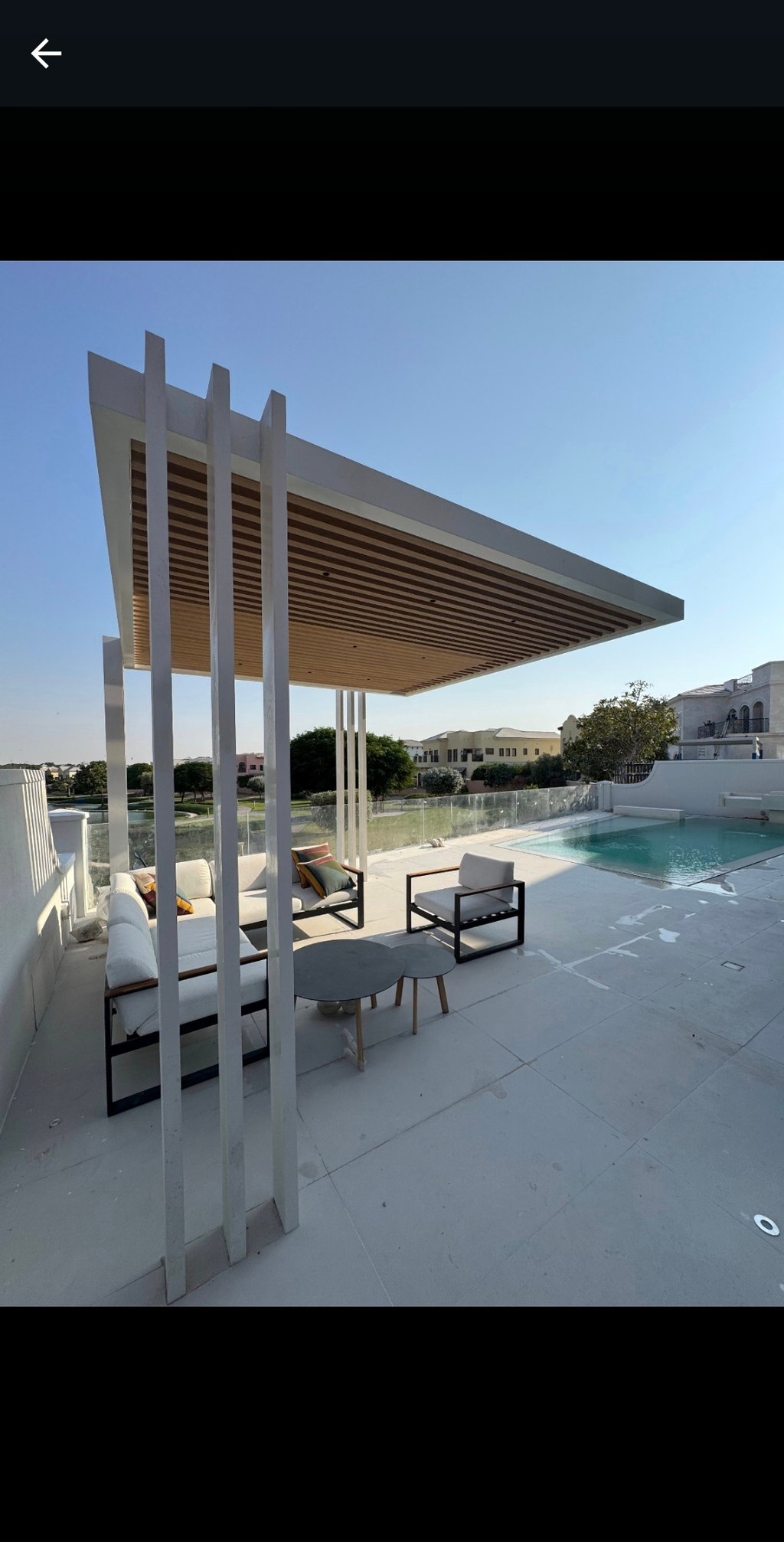 Water-resistant aluminum pergola and pool cabana for outdoor shade in Dubai.