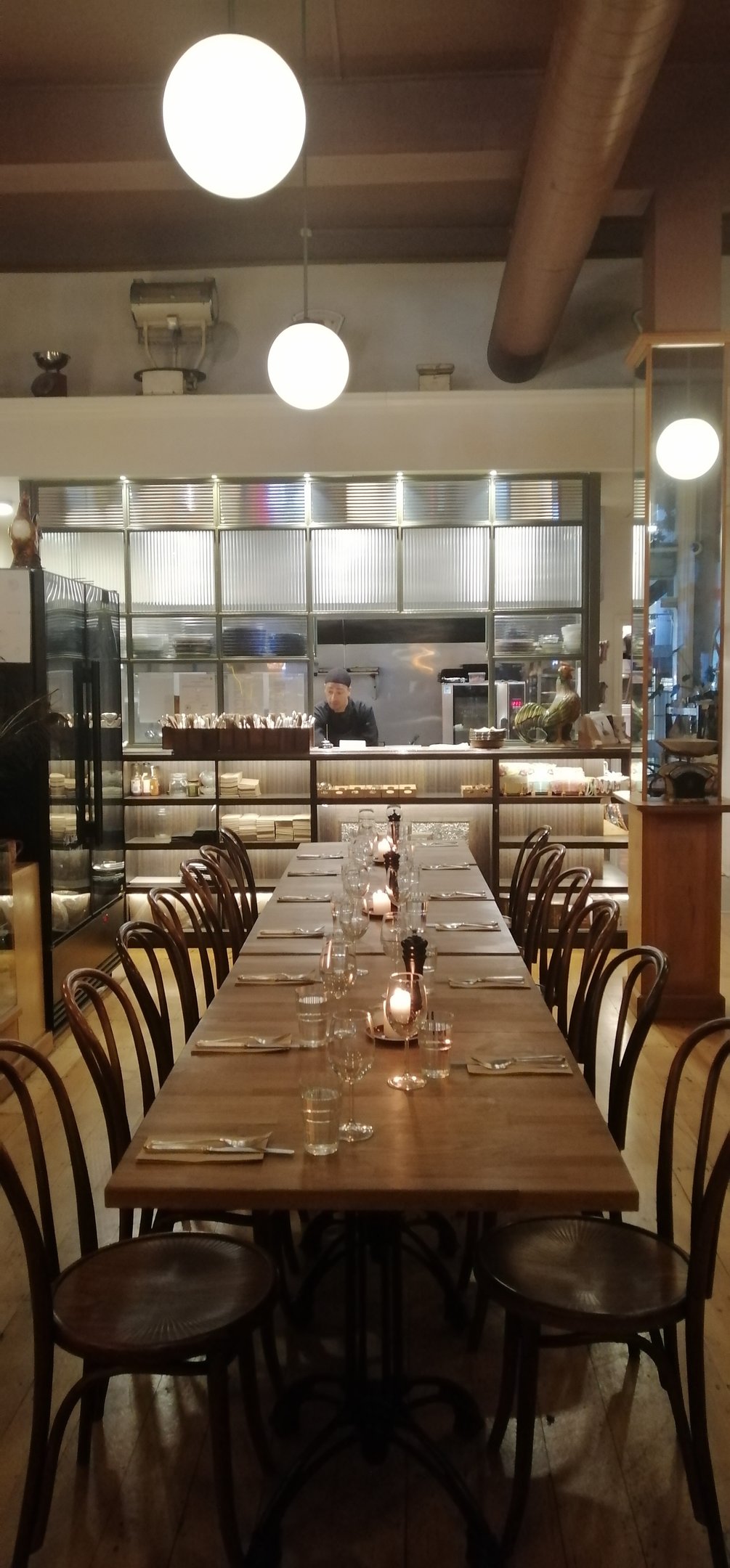 a long table with candles and candles on it