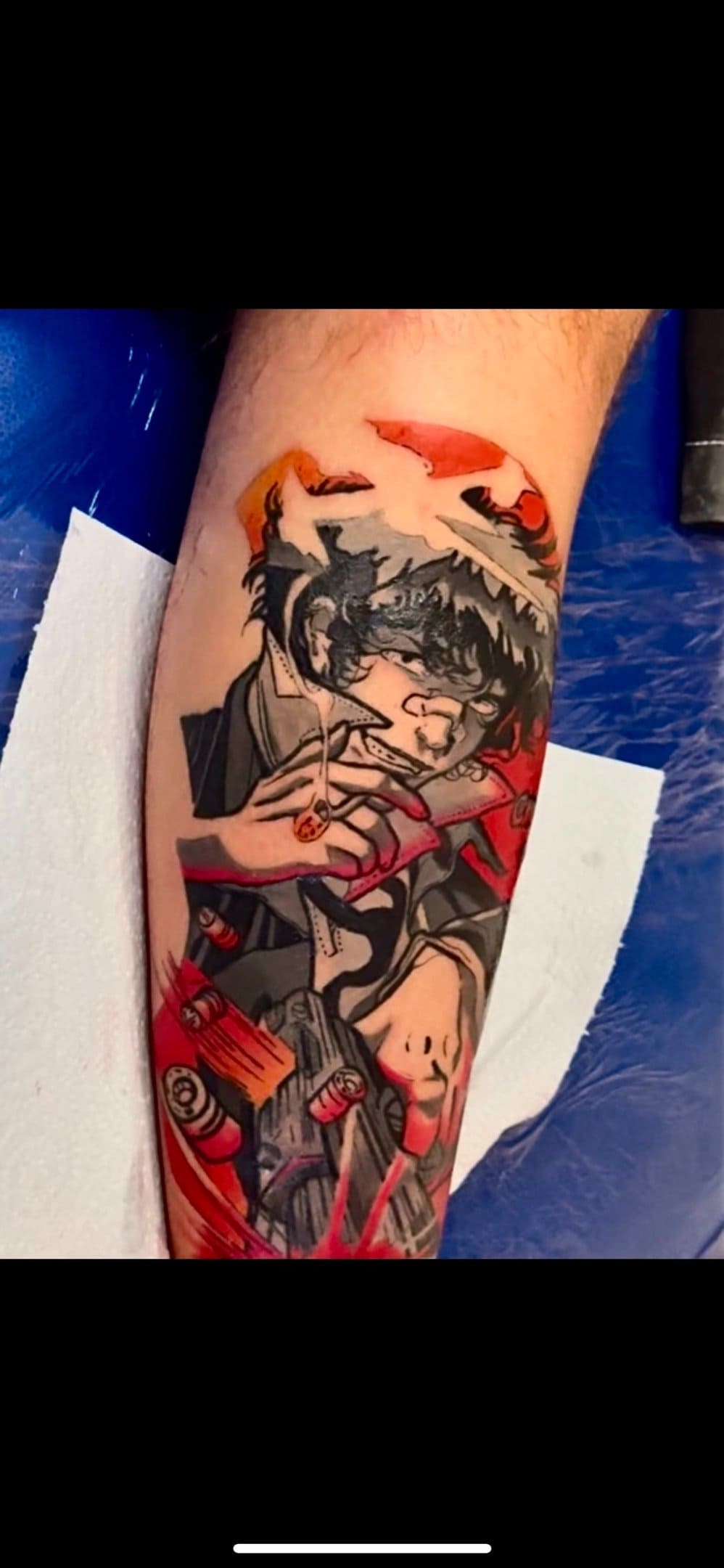 Cowboy Bebop Spike Spiegel anime tattoo with red highlights and gun details.