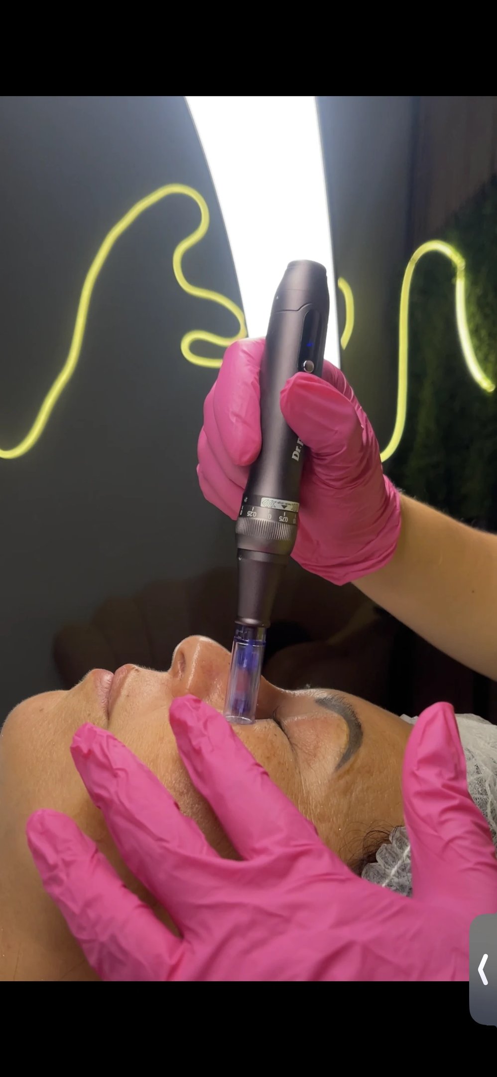 a woman getting a facial lift in a beauty salon