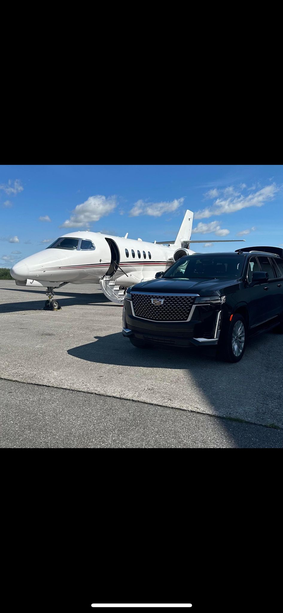 Emilios limo parked on the tarmac of a private jet