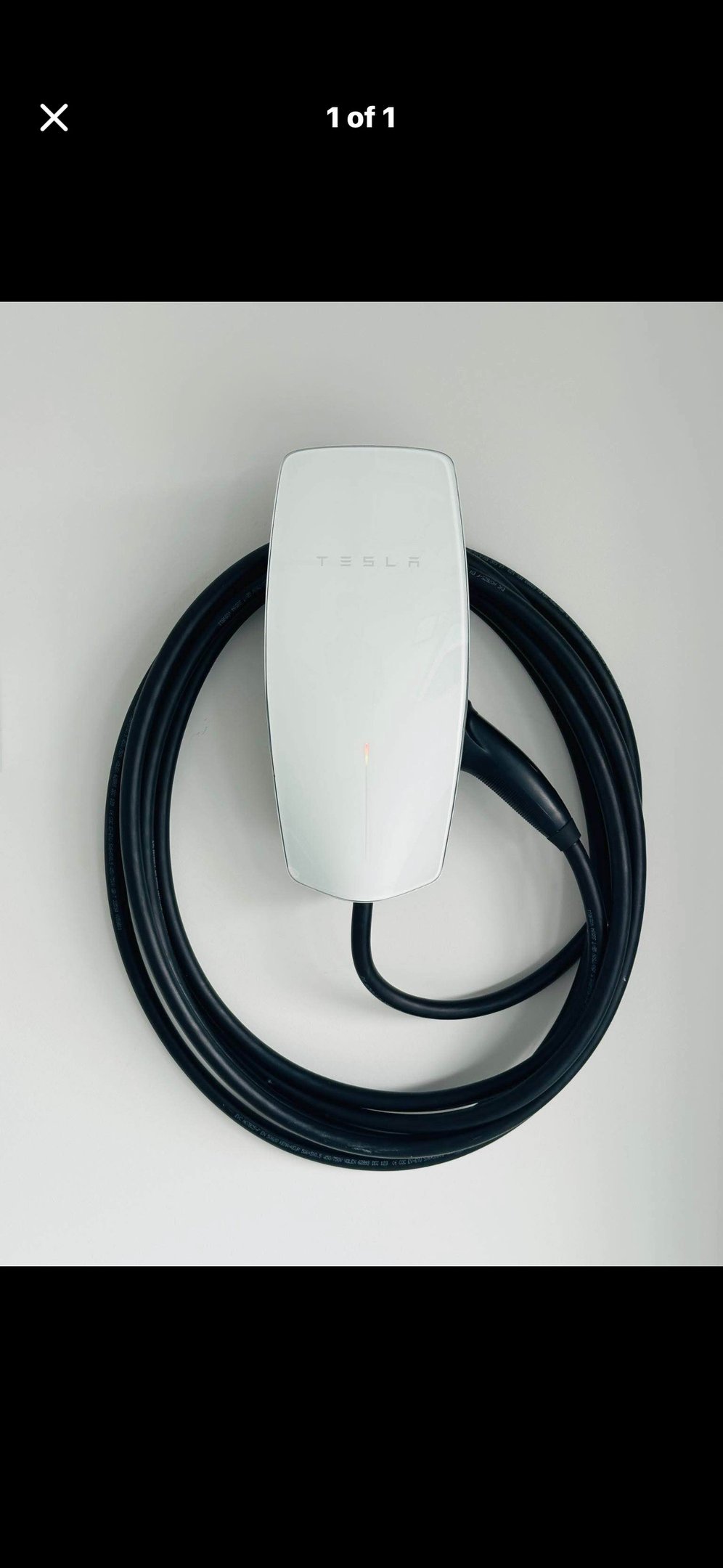 Tesla Gen 3 EV charger mounted in garage by Auckland electrician