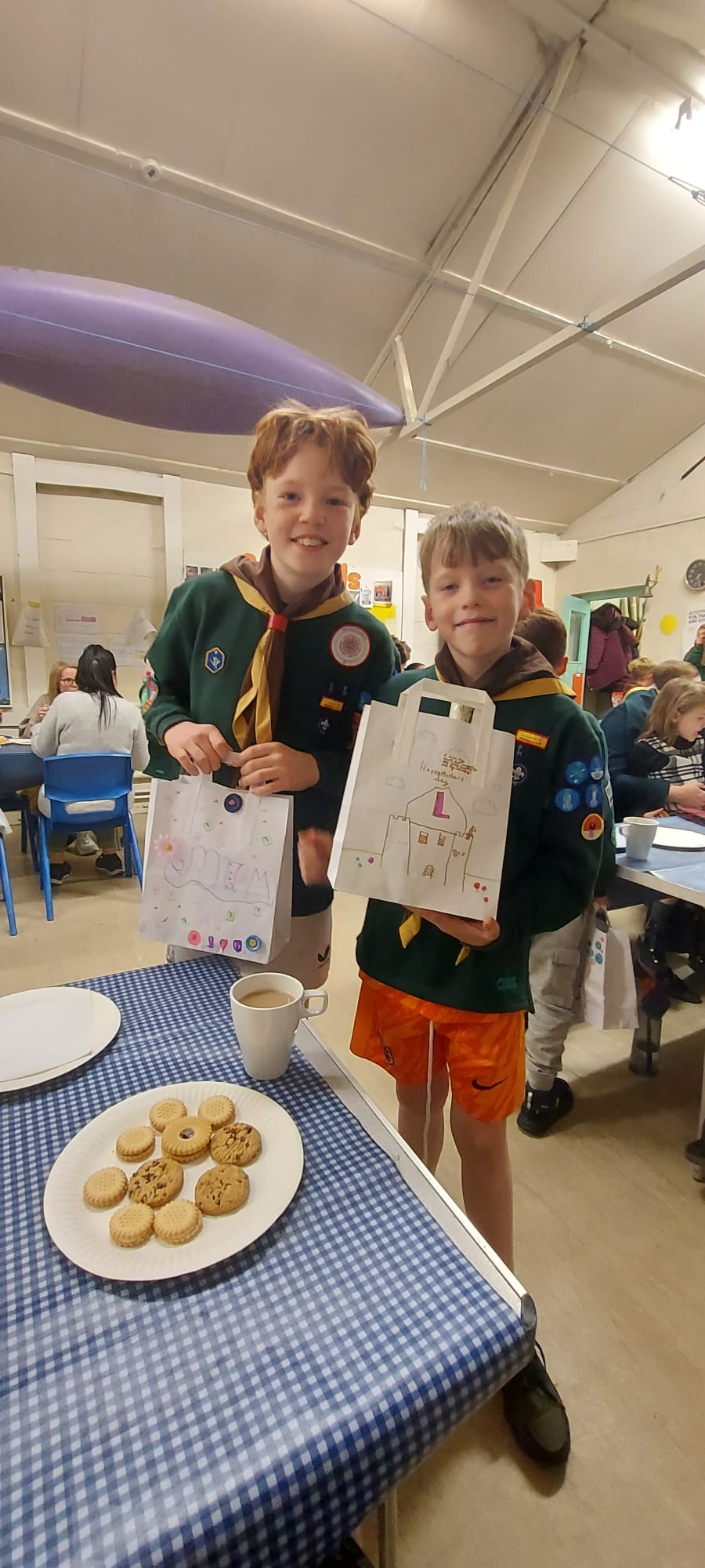 Cub Scouts smiling inside the 25th Allerton Scout Hut in South Liverpool