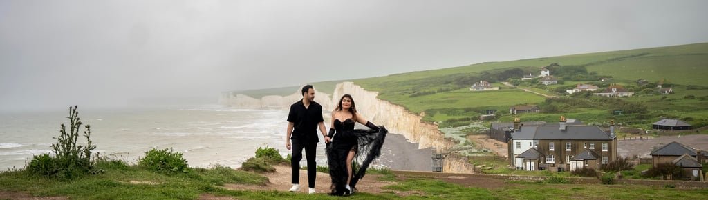 Couple walking along seaside White Cliffs – romantic outdoor photoshoot in Kent by Fred Art Studio