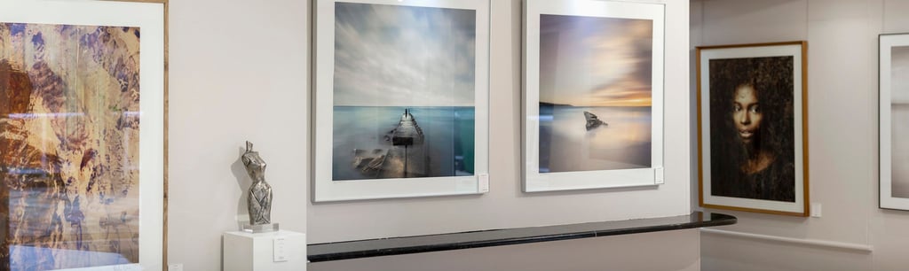 Interior of Osner Gallery in Hout Bay, featuring fine art photography, original artworks, by Martin and Samantha Osner