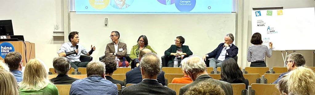 discussion panel with artist drawing on a white board