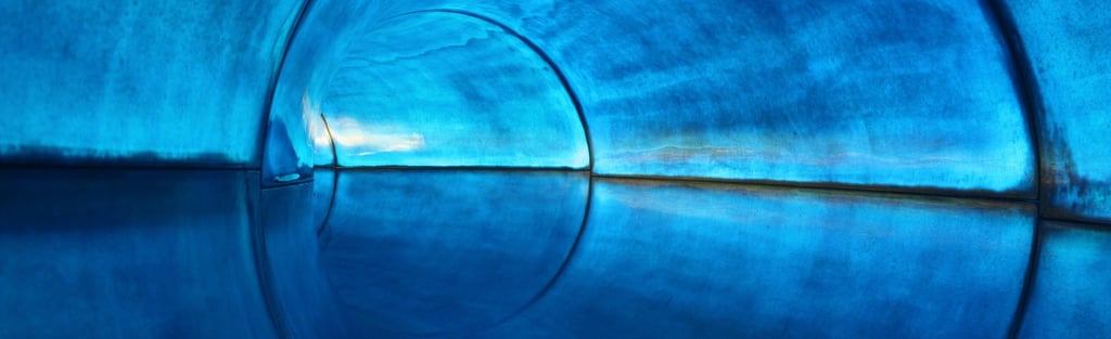 The inside of a waterslide.