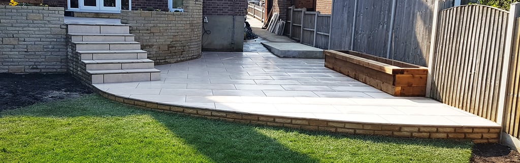 Elevated raised porcelain patio renovation and lawn relevelling 
