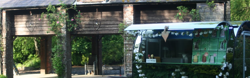 Event trailer in front of wedding barn. Decorated for the occasion.