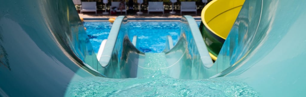 a pov view of a waterslide with flowing water