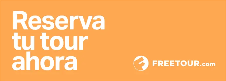 Orange banner with white text in Spanish saying Reserva tu tour ahora and the Freetour.com logo.