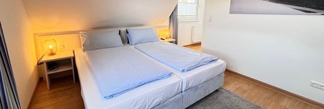 Hotel DunenNest - Kleines Suite, Schlafzimmer, Boxspringbett