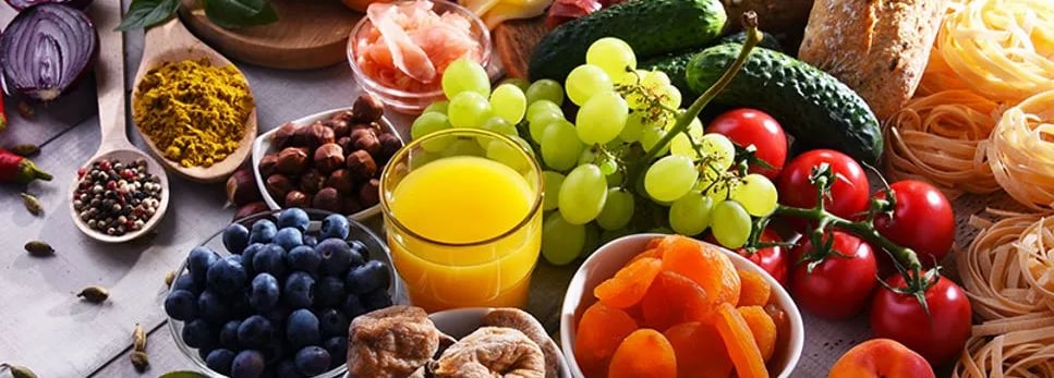 a variety of foods and drinks on a table