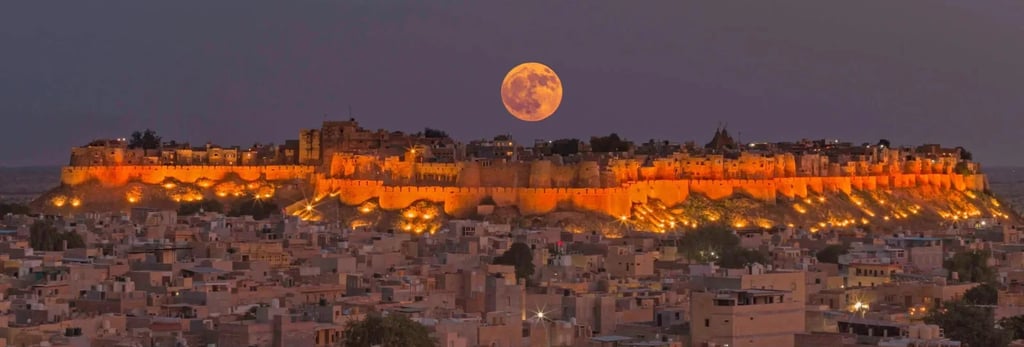 a full moon rising over a city with a full moon in the sky
