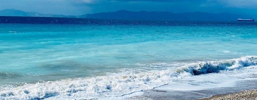 Shadows on the horizon, the blue sea