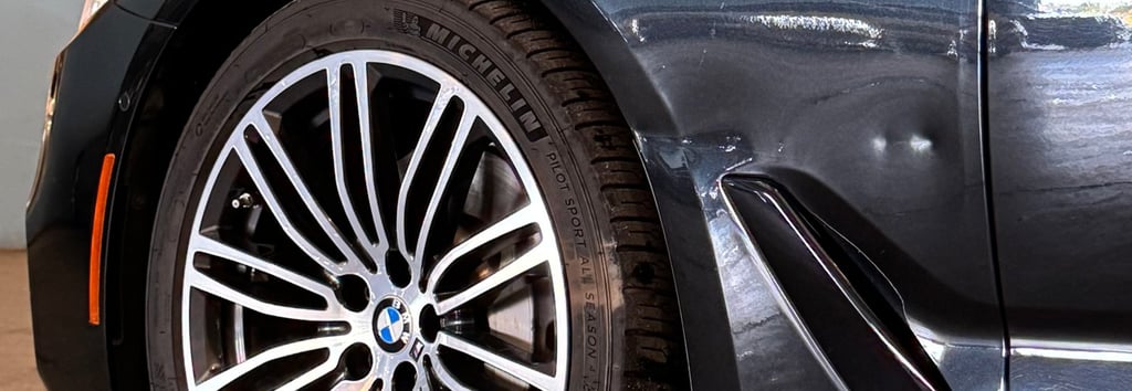 BMW fender damage. Aluminium panel