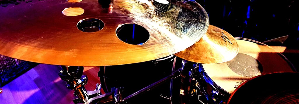 a drum kit with a drum set up in a recording studio