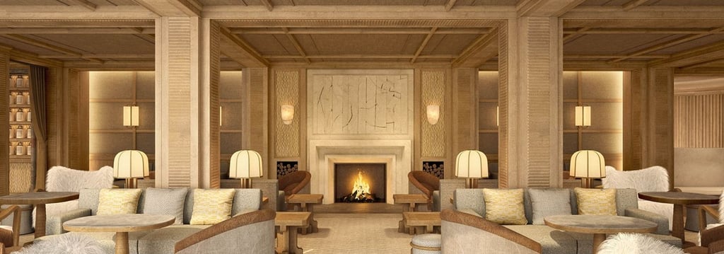 The Park Gstaad hotel lounge with a cozy fireplace, wood paneled walls, and elegant plush seating.