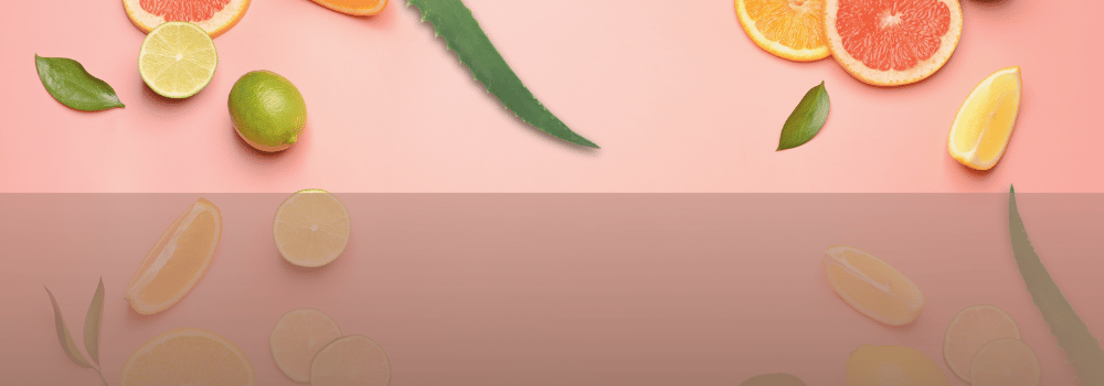 a group of citrus fruits and lemonade slices