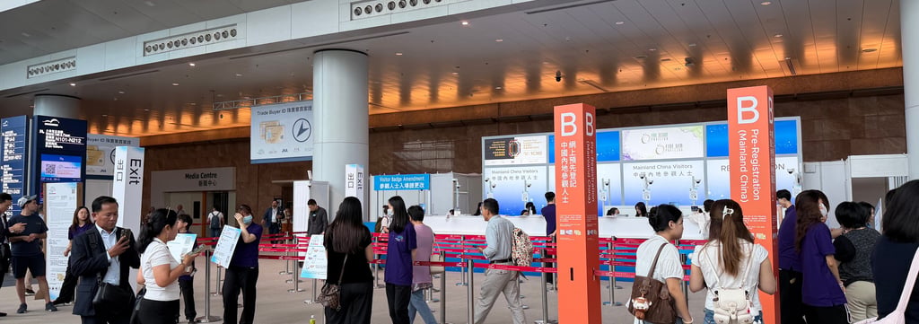 Info Salons staff managing the onsite registration and data desk at JGA Hong Kong 2026