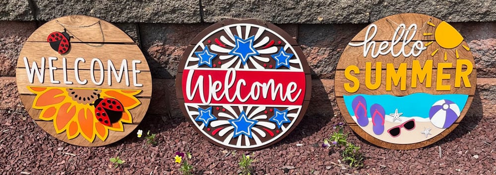 laser cut and colorfully painted wooden door or wall hangers