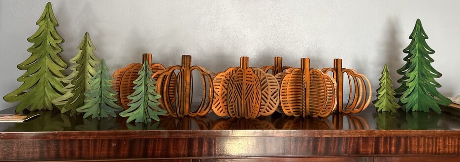 laser engraved and painted slatted tree and pumpkin decorations