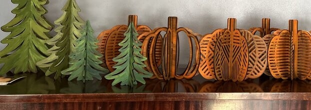 laser engraved and painted slatted tree and pumpkin decorations