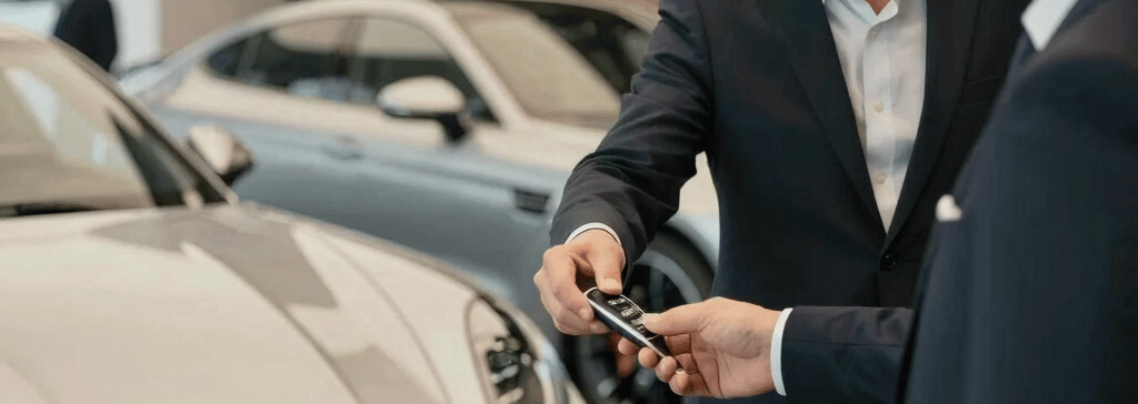 Close-up of premium car interior details showcasing leather seats and polished gold accents.