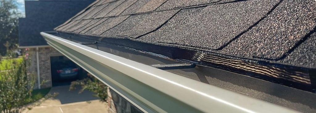 Brand new gutters installed following a full roof replacement for customer in Bullard, TX