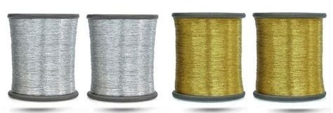 a set of three spools of different colors of thread thread thread thread thread