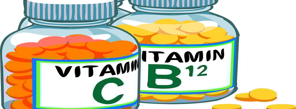Vitamin C and Vitamin B12 pills in Jar