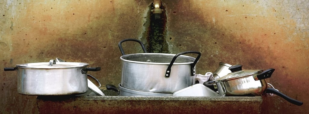 Dirty Cooking Utensils in sink