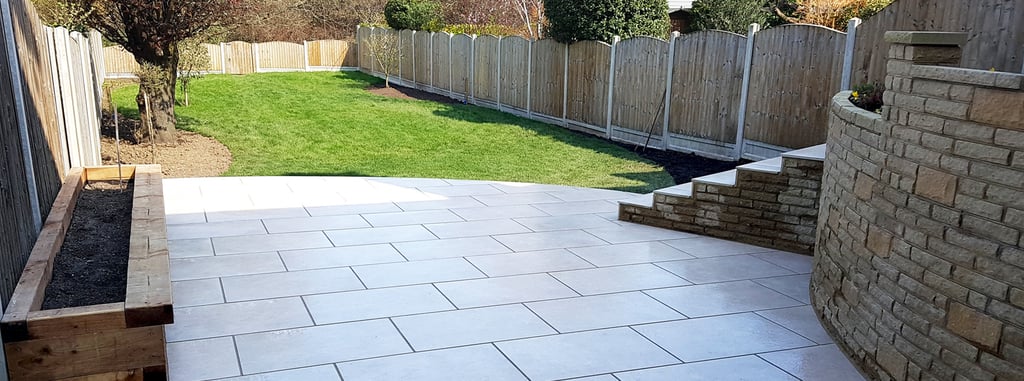 Elevated raised porcelain patio renovation and lawn relevelling 