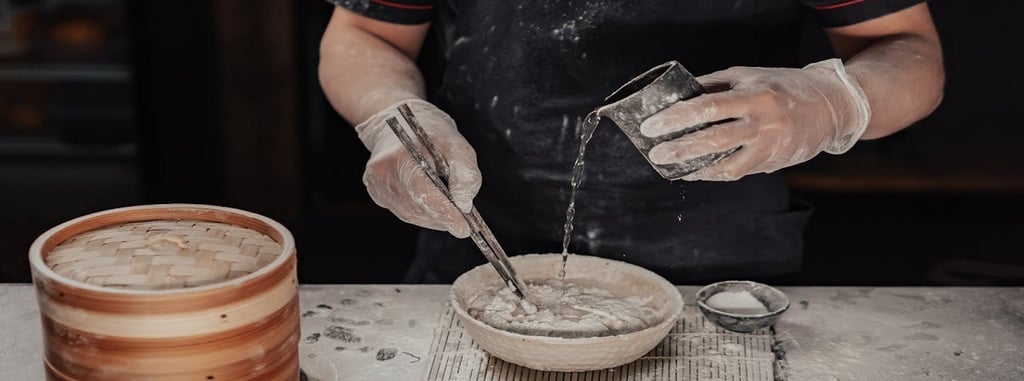 Man pouring water in a flour bowl