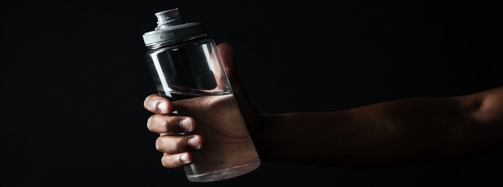 A man holding water bottle