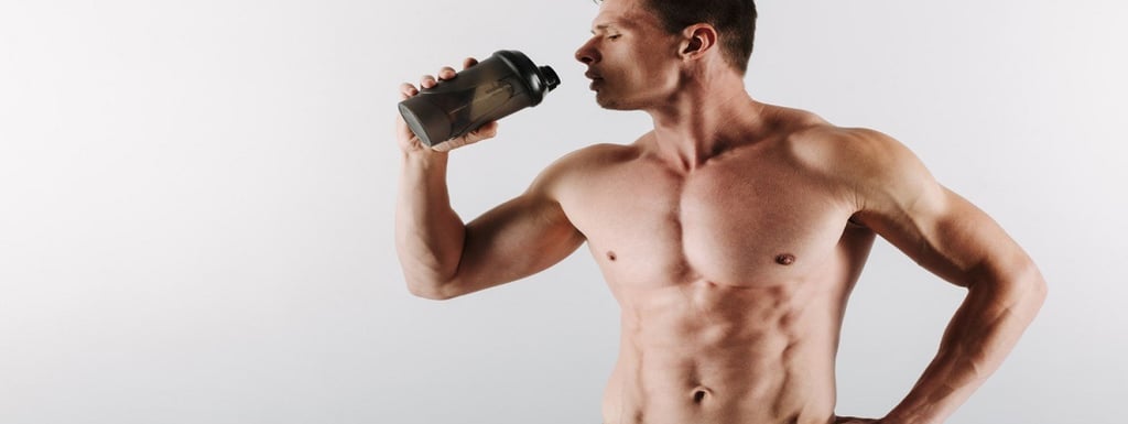 A man drinking from shaker