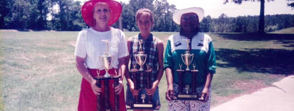 Par Four Golf Club image of three women golfers winners