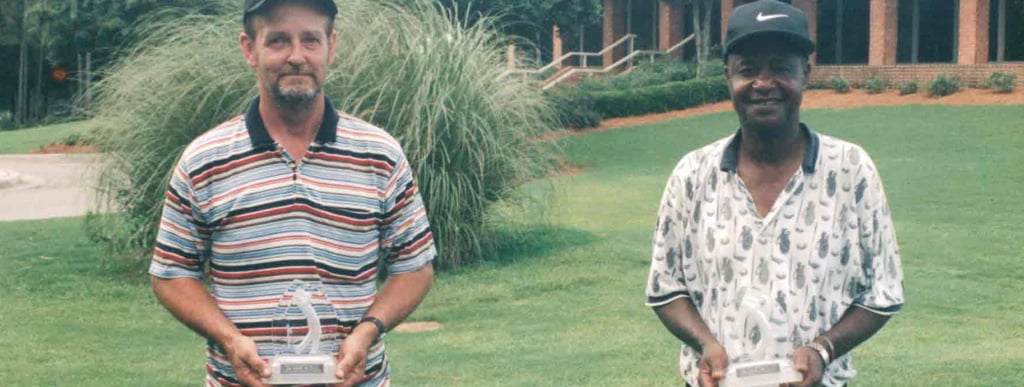 Par Four Golf Club image of two golf winners