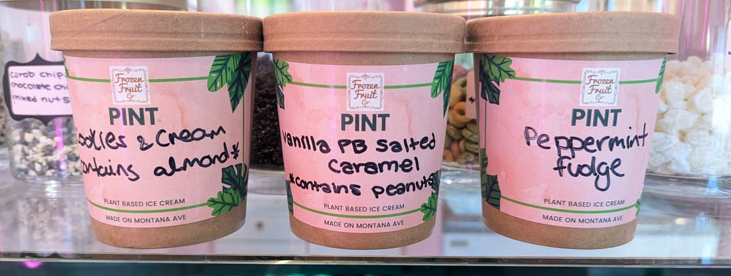 three cups of coffee and a cup of coffee on a shelf